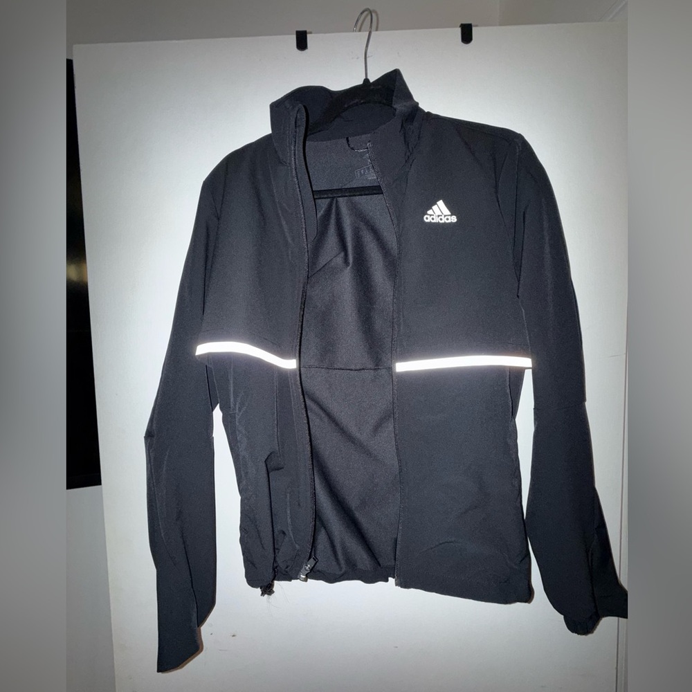 Adidas Black Jacket with White Accents .